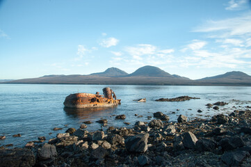 Shipwreck on the shores of Islay, Paps of Jura in the background