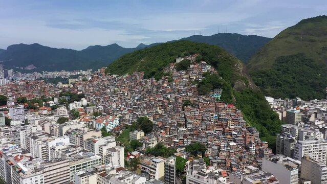 Cantagalo and Pavao-Pavaozinho Favelas. Rio de Janeiro, Brazil. Aerial View. Drone Flies Forward