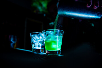 bartender making cocktail in bar