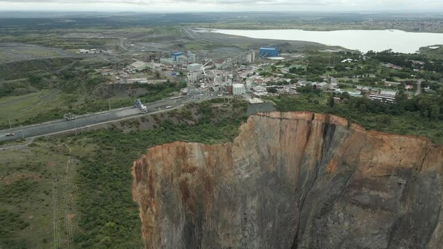 Aerial orbits Cullinan Diamond Mine and massive abandoned open pit