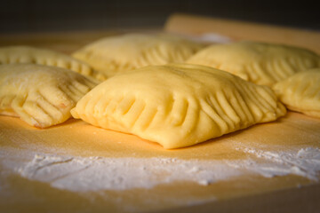 Close-up view of home made pastry on wooden board