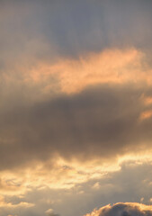 Streaks of orange clouds - vertical photo