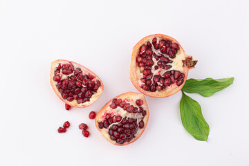 Piece of Fresh ripe pomegranate isolated
