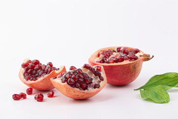 Piece of Fresh ripe pomegranate isolated
