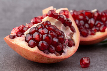 Piece of Fresh ripe pomegranate isolated