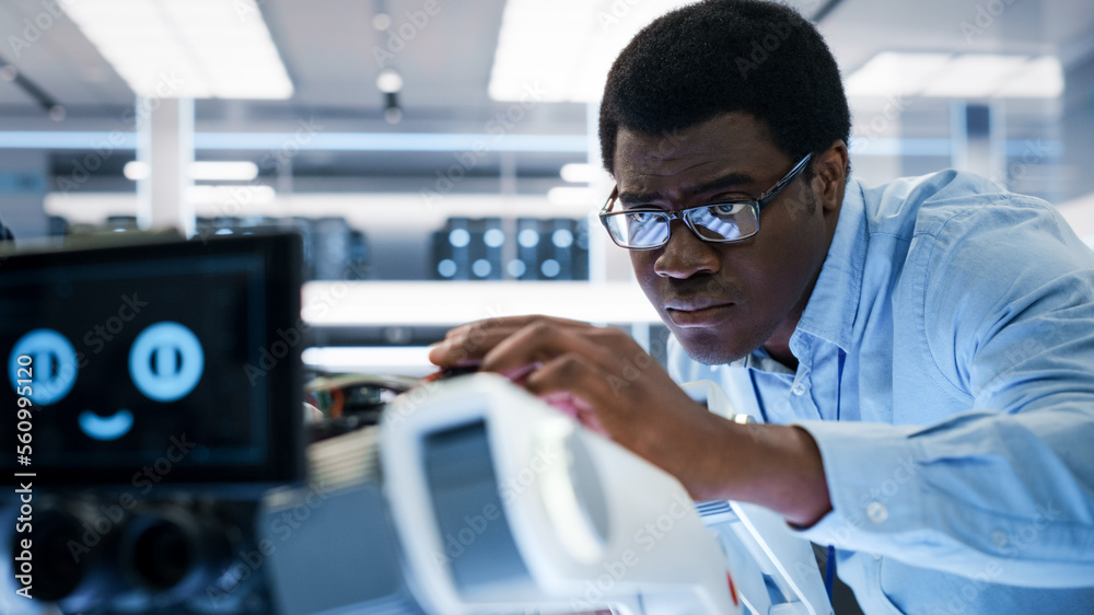 Poster Close Up of an African Engineer Using a Screwdriver While Developing a Robot Dog Concept. Black Specialist Working in High Tech Research Laboratory with Modern Equipment.