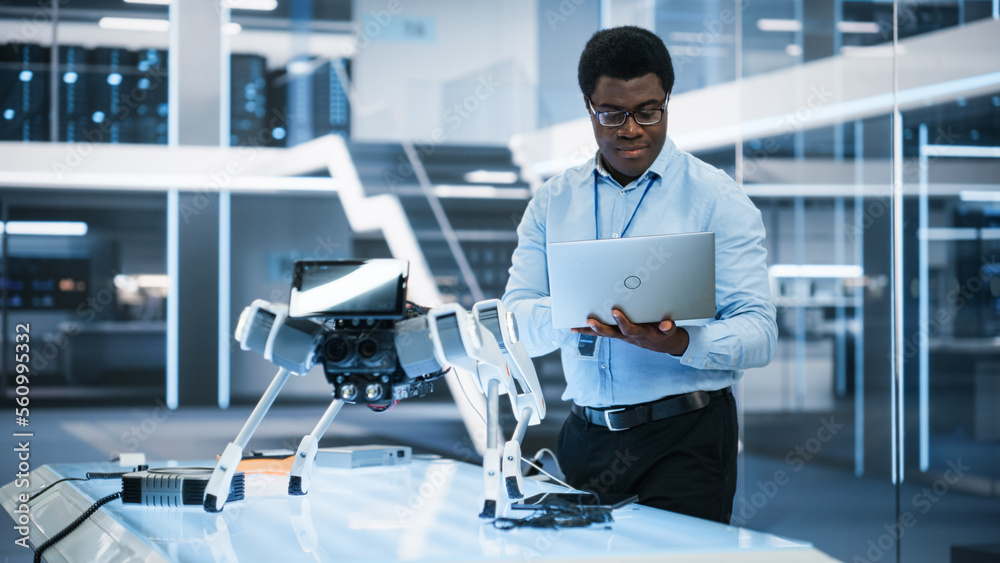 Poster handsome black man wearing glasses using laptop computer. young intelligent male engineer or scienti