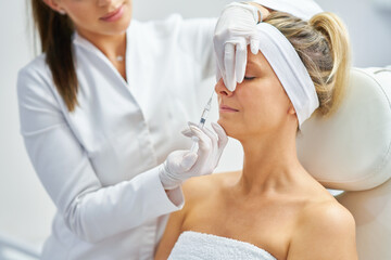 A scene of medical cosmetology treatments botulinum injection.