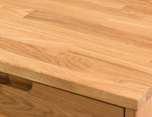 Drawers close view photo, wooden furniture elements background. Furniture details