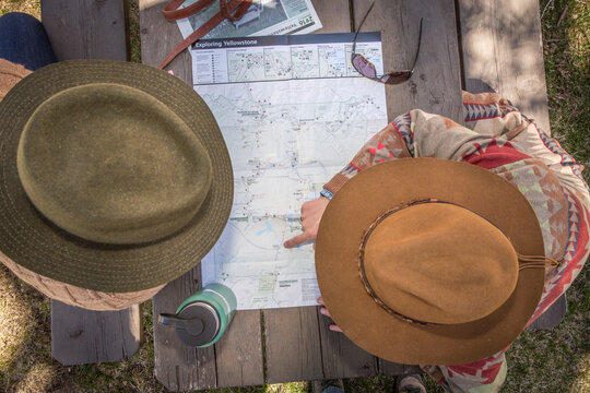 Two girls try to deceide where to go in Yellowstone National Park.