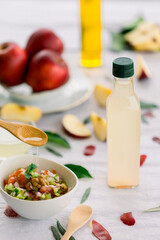 various salad vinegars in glass bottles. Front and top view. apple, lemon, strawberry, quince, grape, melon, apricot, tangerine, orange, grapefruit,
