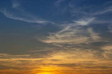 sunset sky with multicolor clouds. Dramatic twilight sky background