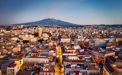 Aerial view of the Catanial by sunset with Mount Etna in the background - Sicily, Italy