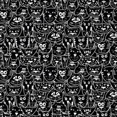 Black and white seamless vector pattern with cat faces