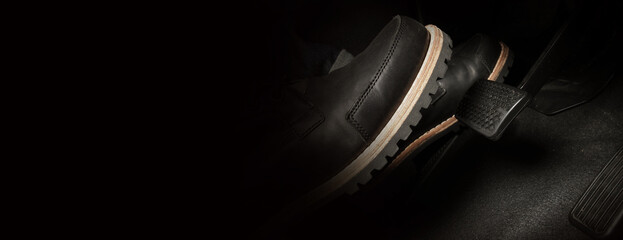 Car accelerate and brake foot pedal. Close up foot press or push foot break and accelerate pedal of...