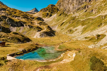 Beautiful alpine summer view with reflections in a lake at the famous Weisssee Gletscherwelt, Uttendorf, Salzburg, Austria