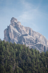 Amazing mountain cliffs viewed from Lago di Dobbiaco - The dolomites - Italy