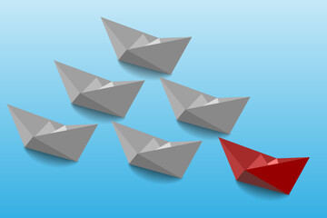 Leadership and business concept. One red leader ship leads other ships