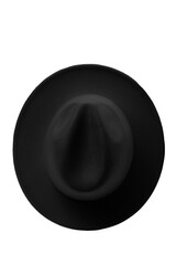 Close-up shot of a black wide-brimmed fedora. A black men's felt fedora hat is isolated on a white background. Top view. - obrazy, fototapety, plakaty