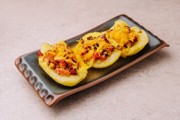 Baked stuffed bell peppers filled with bacon