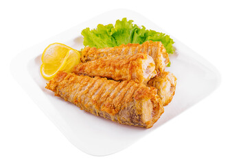 Delicious Fried Fish with lemon on plate