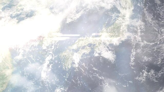 Earth zoom in from outer space to city. Zooming on Onomichi, Hiroshima, Japan. The animation continues by zoom out through clouds and atmosphere into space. Images from NASA
