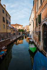 Fototapeta na wymiar Buildings, canals and amazing architecture of the old city of Venice - Italy
