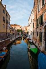 Fototapeta na wymiar Buildings, canals and amazing architecture of the old city of Venice - Italy