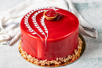 Raspberry cake. Celebration or birthday cake covered with raspberry on the outside and filled with forest fruits. Special design. close up