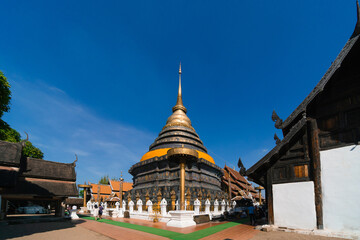 Fototapeta premium Ancient pagoda of Wat Phra That Lampang Luang temple religion the most famous Buddhist temple and the attraction landmark tourist destination in Lampang, Northern Thailand.