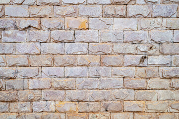 Fototapeta premium Colorful brick wall. Horizontal image. Advertising space.