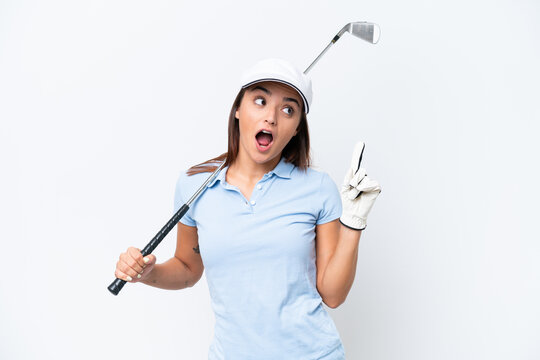 Young caucasian woman playing golf isolated on white background thinking an idea pointing the finger up