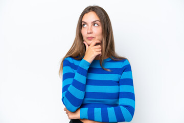 Young caucasian woman isolated on white background thinking an idea while looking up