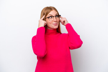 Young redhead woman isolated on white background having doubts and thinking