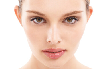 Obraz premium Face, beauty and woman in portrait with skin, skincare closeup with glow against white background. Eyes, vision and facial zoom with makeup and natural cosmetics, dermatology and wellness
