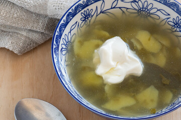 Soup with sorrel, potatoes and sour cream