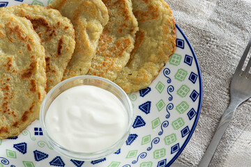 potato pancakes and sour cream
