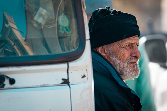 old man with white beard in Baghdad