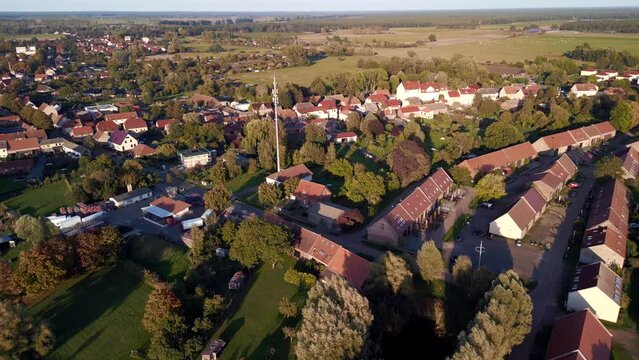 kremmen town surrounded by fields meadows. Smooth aerial view flight drone