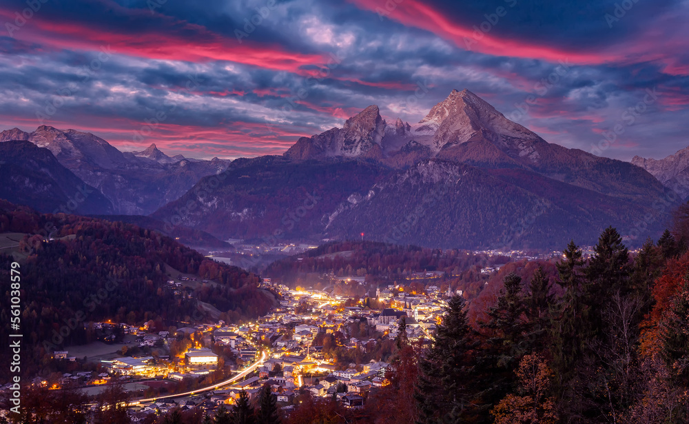 Fototapete Incredible morning countryside. Impressive mountain scenery in the Bavarian Alps with colorful sky. Alpine village of Berchtesgaden  and Watzmann massif in background. Popular travel destination