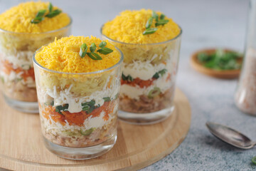 Mimosa salad in transparent glass