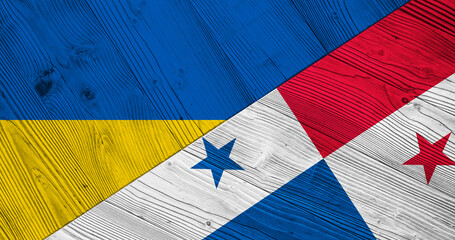 Background with flag of Ukraine and Panama on wooden split plank. 3d illustration