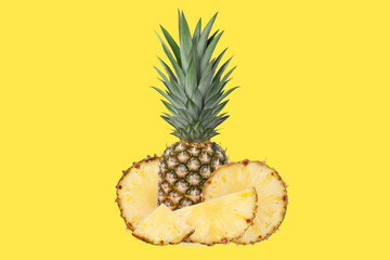 Whole juicy fresh pineapple. Pieces of pineapple in circles, rings, halves, quarters. on a yellow background.