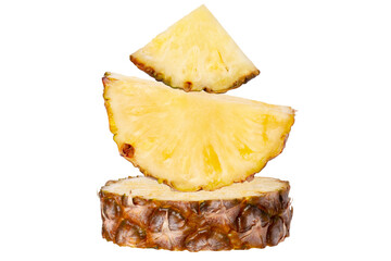 Pieces of fresh pineapple folded into a pyramid of various shapes. Isolated.