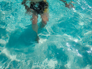 Blurred contours of a person in the pool