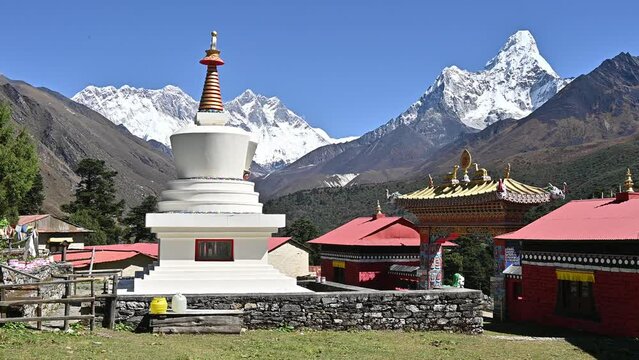Tibetan Buddhism stupa in Tengboche monastery with beautiful view of Mt.Everest, Mt.Lhotse and Mt.Ama Dablam in the background.