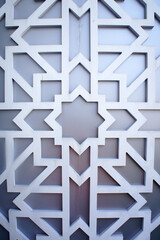 JOHOR, MALAYSIA -AUGUST 2, 2022: Islamic geometry pattern made from ground fiber reinforcement concrete used as building facade wall decoration. Permanently installed and painted.