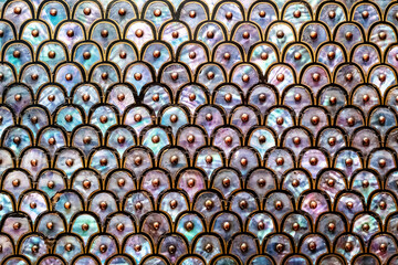 Abstract background of mother of pearl. Circular and overlapping antique design of nacre or abalone...