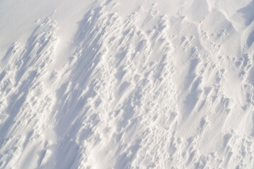 Snow texture, frozen snow formed by a blizzard.