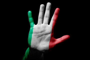 man hand with flag of Italy in stop sign